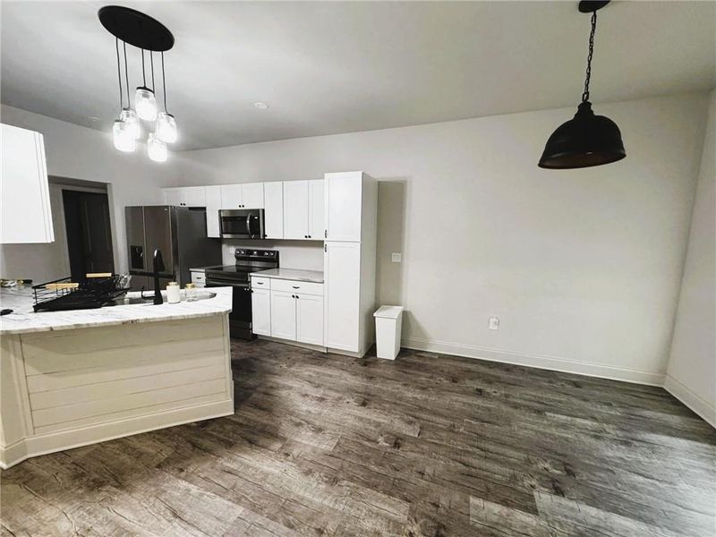 Furnished interior view inside a new home in , Commerce (Image 6).