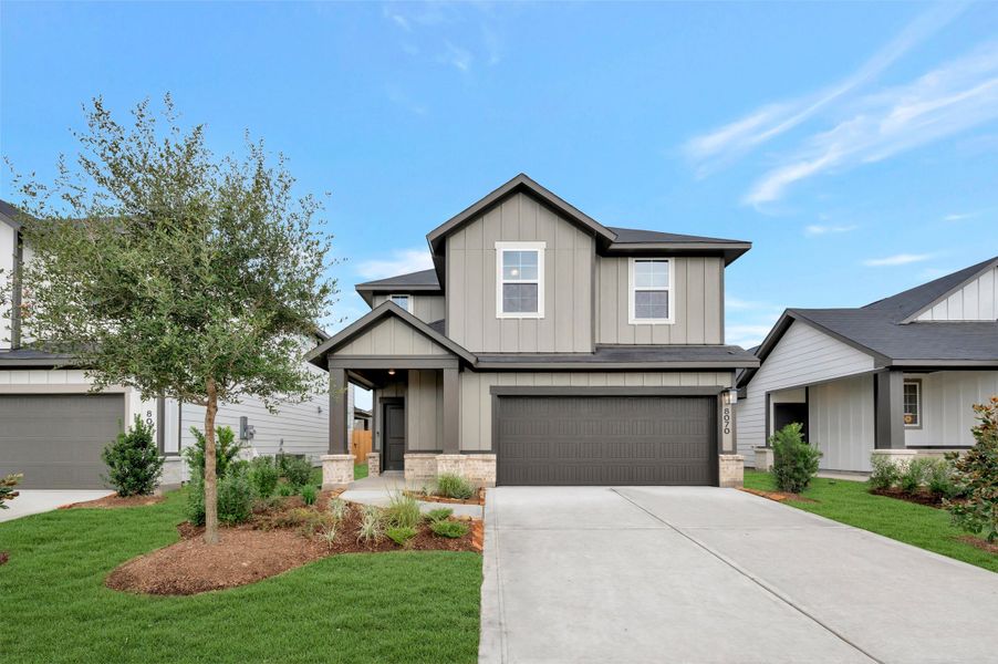 Front exterior of a new home in Mason Woods, Cypress, TX, highlighting curb appeal (Image 1). Front exterior of a new home in Mason Woods, Cypress, TX, highlighting curb appeal (Image 1).