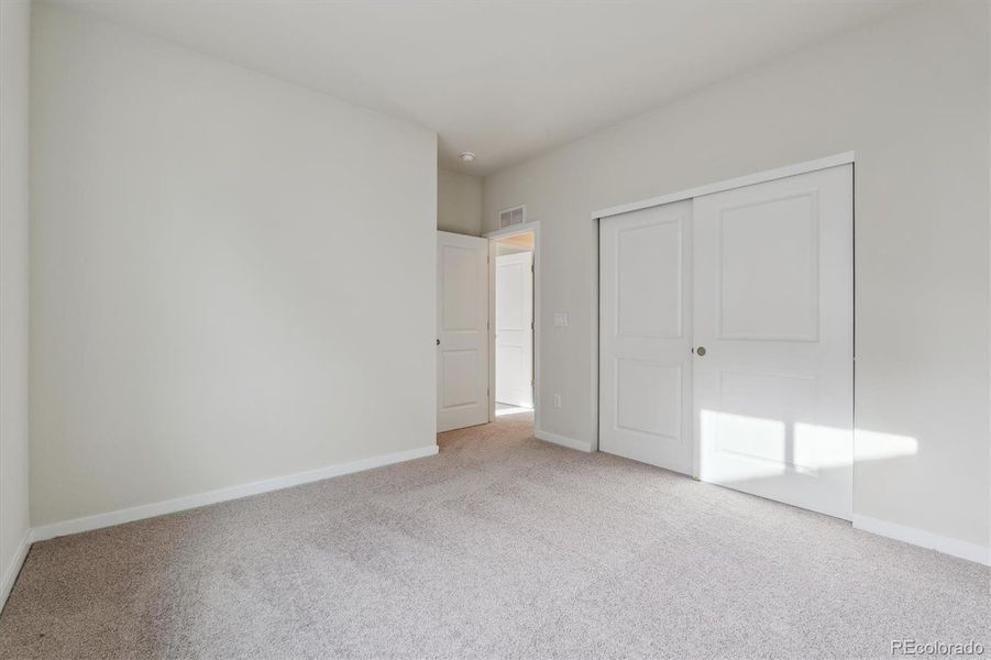 Spacious, unfurnished interior of a new home in Floret Collection at Parkdale Commons, Lafayette (Image 18).