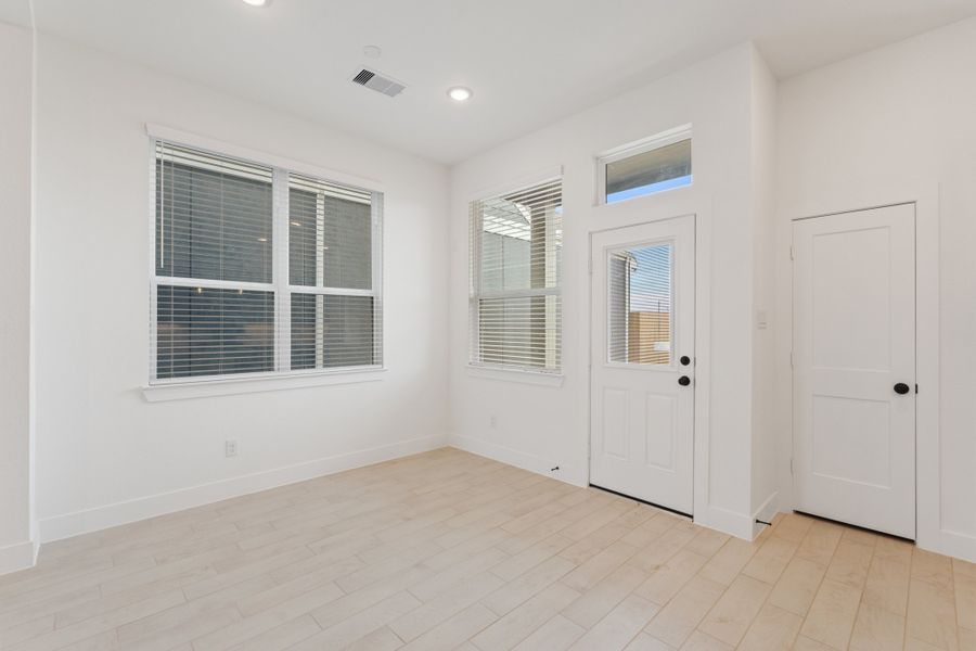 Spacious, unfurnished interior of a new home in Bridgeland, Cypress (Image 44).