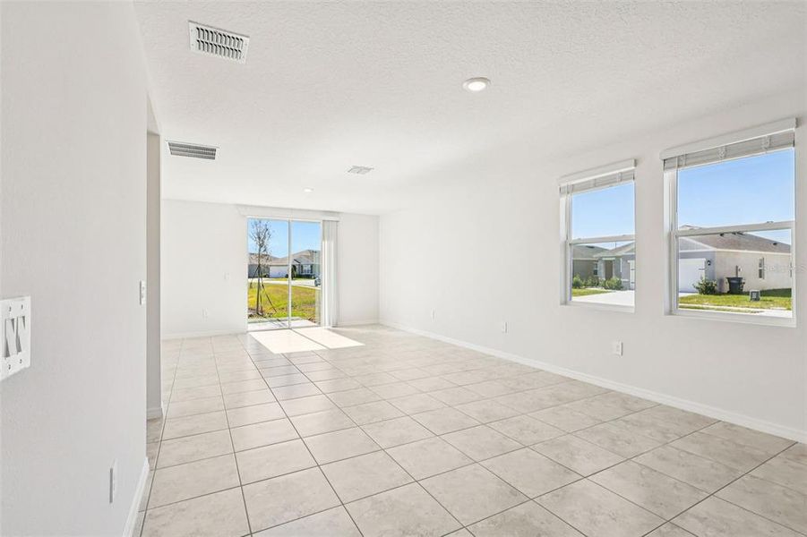 Spacious, unfurnished interior of a new home in Lake Deer Estates - Classic Series, Poinciana (Image 25).