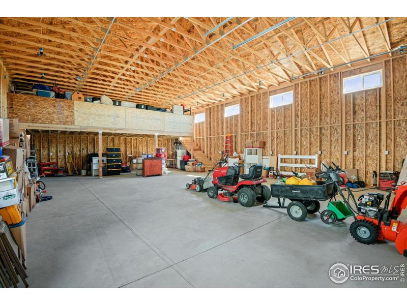 Large upper level loft area for storage with shelving