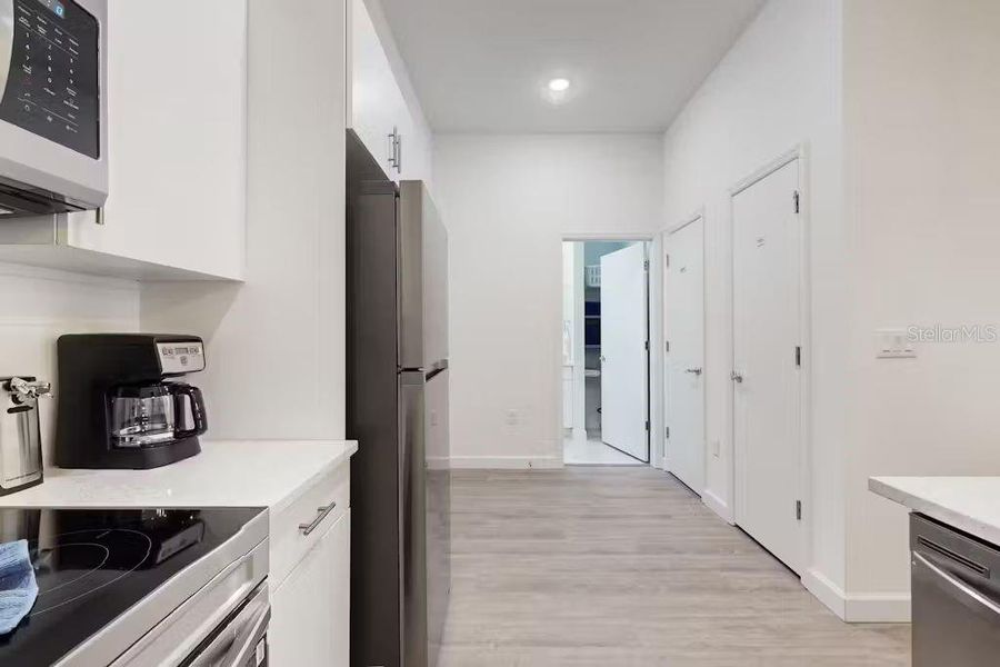 Furnished interior view inside a new home in , Davenport (Image 13).