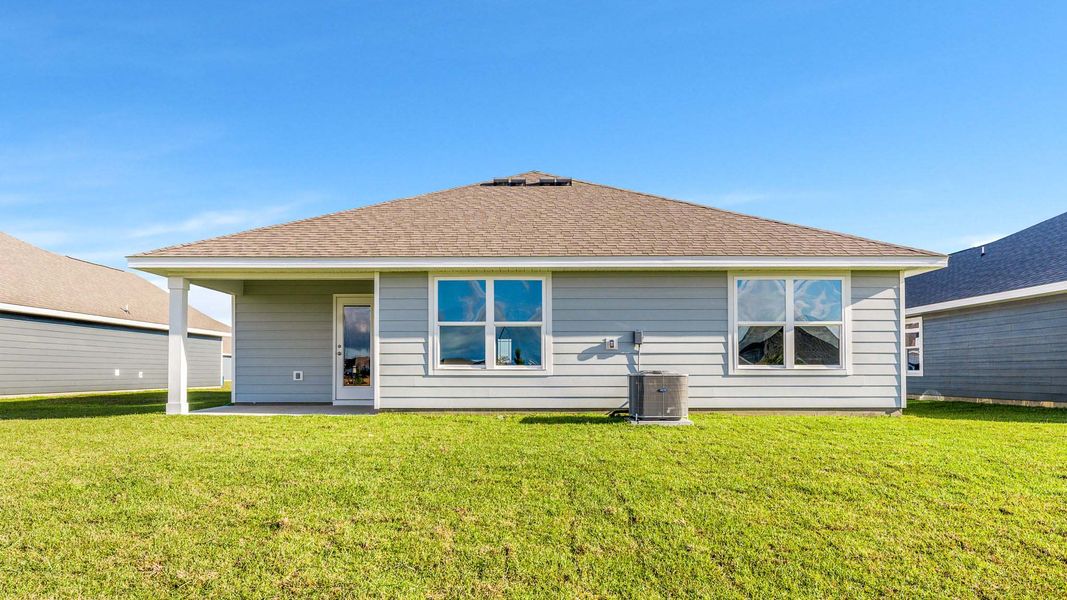 Representative exterior photo of a completed home built from the The Cali by D.R. Horton in Liberty, Panama City, FL (Image 30).