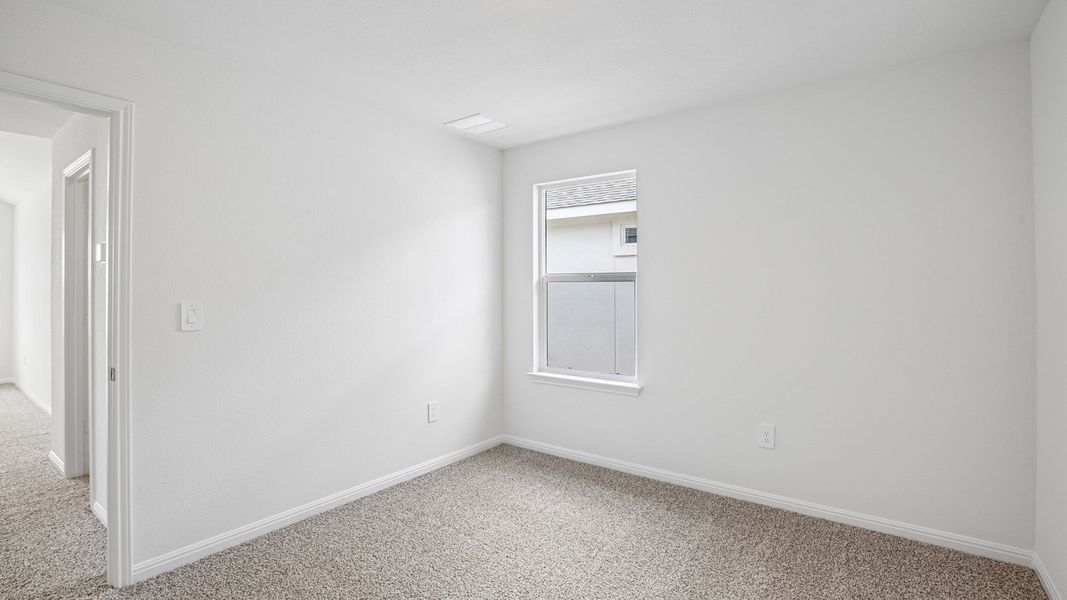 Spacious, unfurnished interior of a new home in Bar W Ranch, Leander (Image 35).