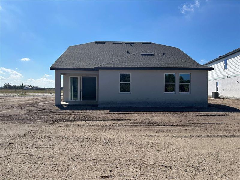 In-progress construction of a new home in Oakfield Trails Signature, Parrish, FL (Image 24).