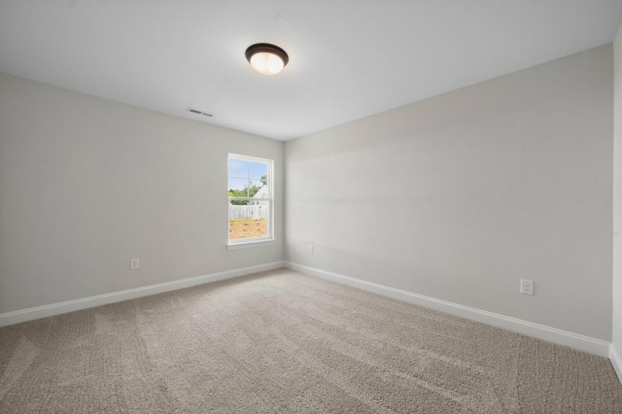 Spacious, unfurnished interior of a new home in Cottages at Piper Village, Trinity (Image 28).