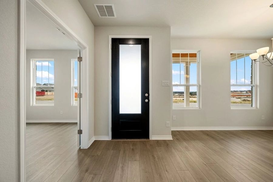 Spacious, unfurnished interior of a new home in The Cottages at Lariat, Liberty Hill (Image 21).