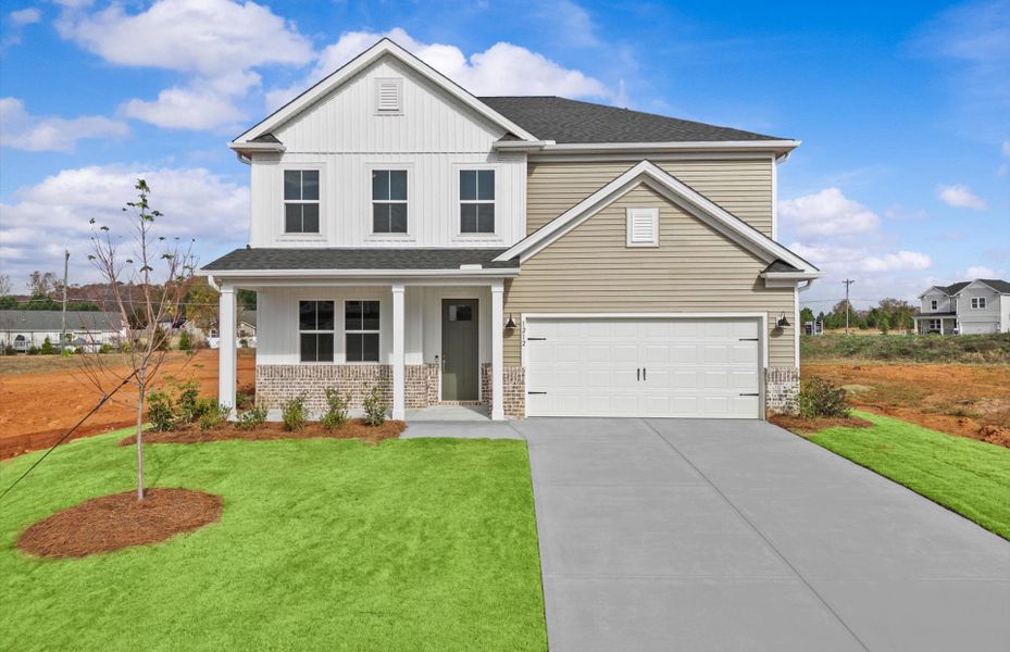 Front exterior of a new home in Fox Hollow, Spartanburg, SC, highlighting curb appeal (Image 2). Front exterior of a new home in Fox Hollow, Spartanburg, SC, highlighting curb appeal (Image 2).
