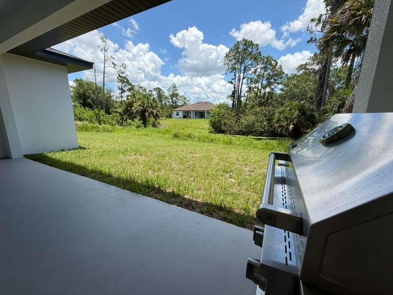 Exterior details and patio area of a home in , North Port (Image 23).