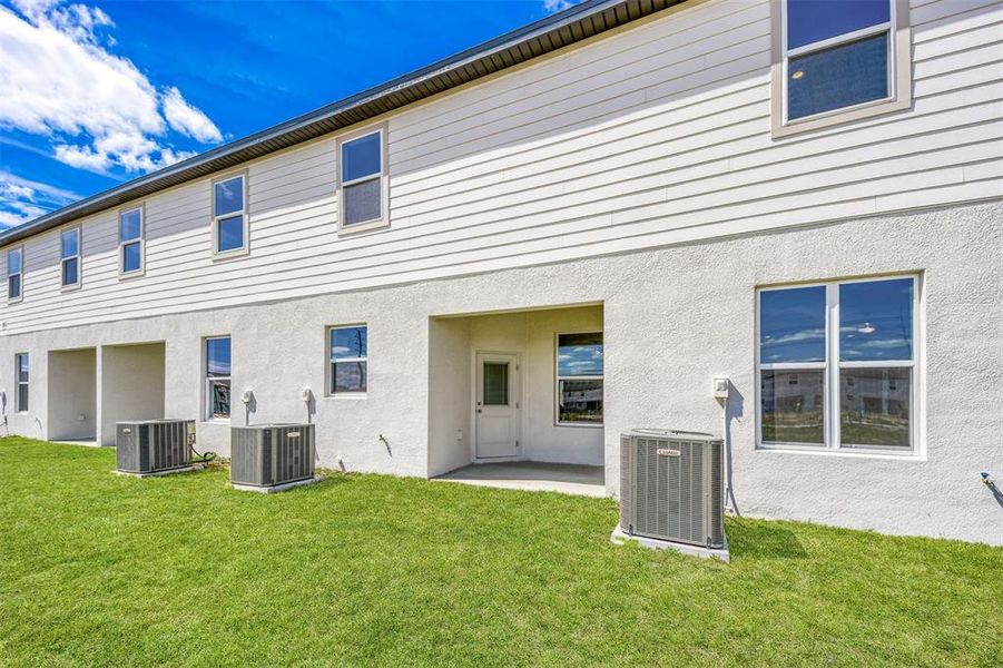 Exterior details and patio area of a home in Sol Vista, Dundee (Image 3).