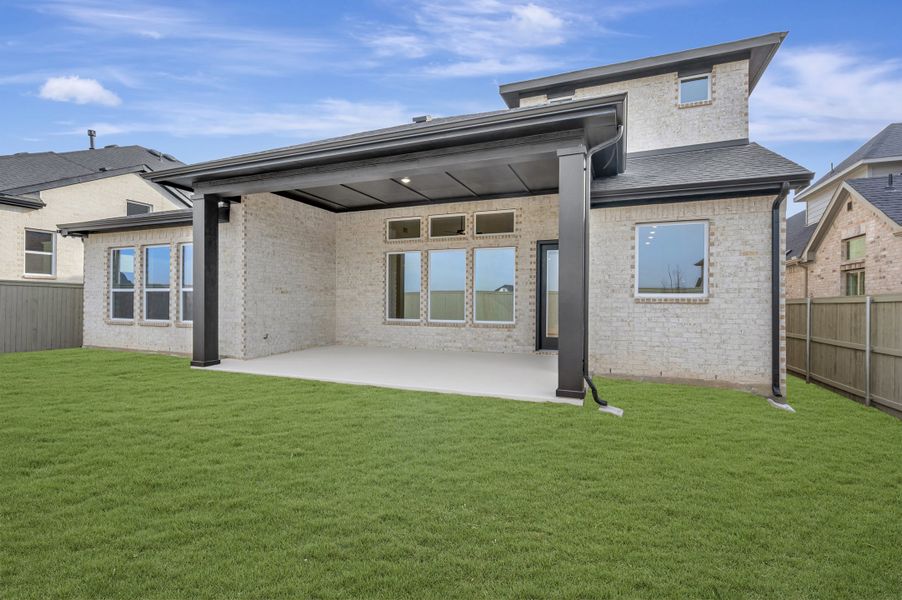 Exterior details and patio area of a home in Pecan Square – Classics, Northlake (Image 4).