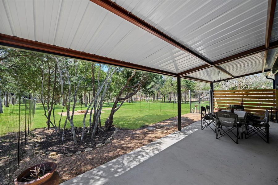 Exterior details and patio area of a home in , Chappell Hill (Image 21).