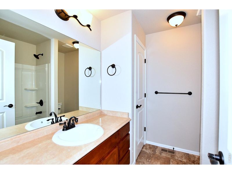 Furnished interior view inside a new home in Union Colony West, Greeley (Image 18).