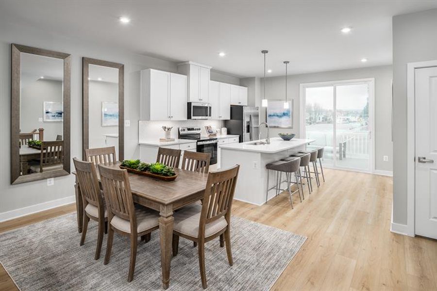 Representative furnished interior of a home built from the Mayer by Ryan Homes in Stowe Branch Townhomes, Charlotte (Image 7).