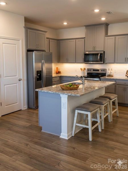 Furnished interior view inside a new home in Riverstone, Monroe (Image 5).