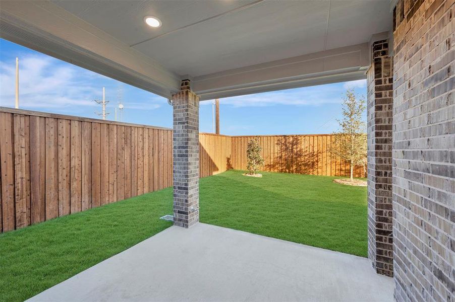 Exterior details and patio area of a home in Kreymer at the Park, Wylie (Image 25).