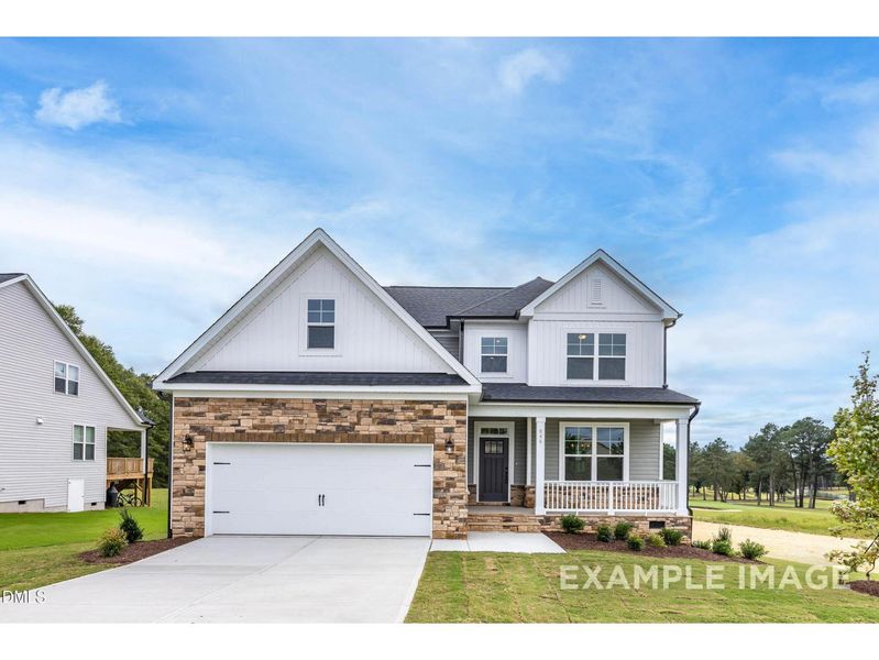 Front exterior of a new home in Retreat at North Main, Lillington, NC, highlighting curb appeal (Image 1).