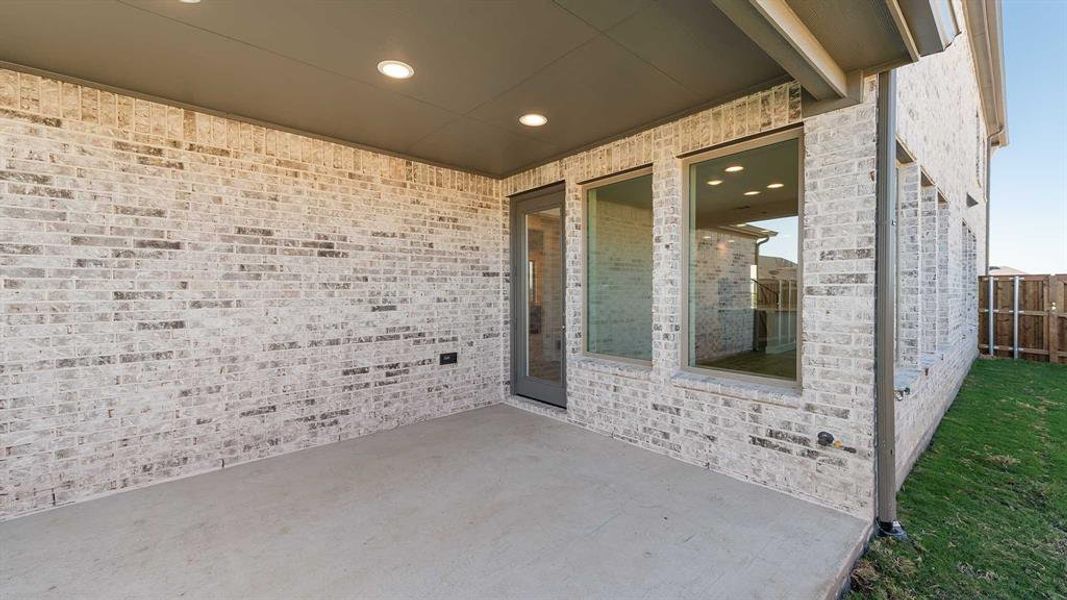 Exterior details and patio area of a home in The Parks At Wilson Creek 40', Celina (Image 3). Exterior details and patio area of a home in The Parks At Wilson Creek 40', Celina (Image 3).