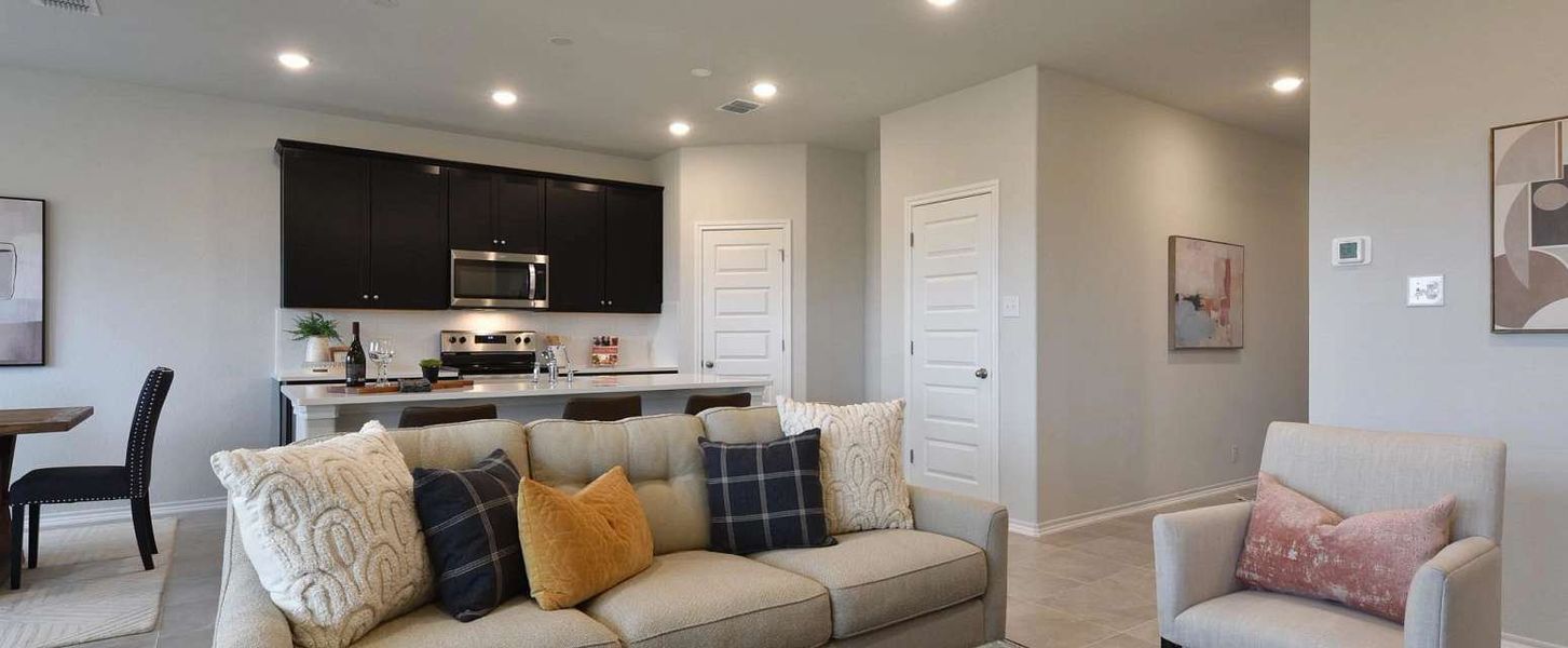 Representative furnished interior of a home built from the Carter by Ashton Woods in Nopal Valley, San Antonio (Image 9).