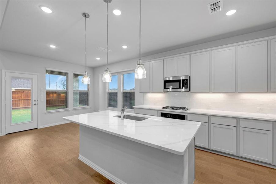 Furnished interior view inside a new home in Lilyana, Celina (Image 11).