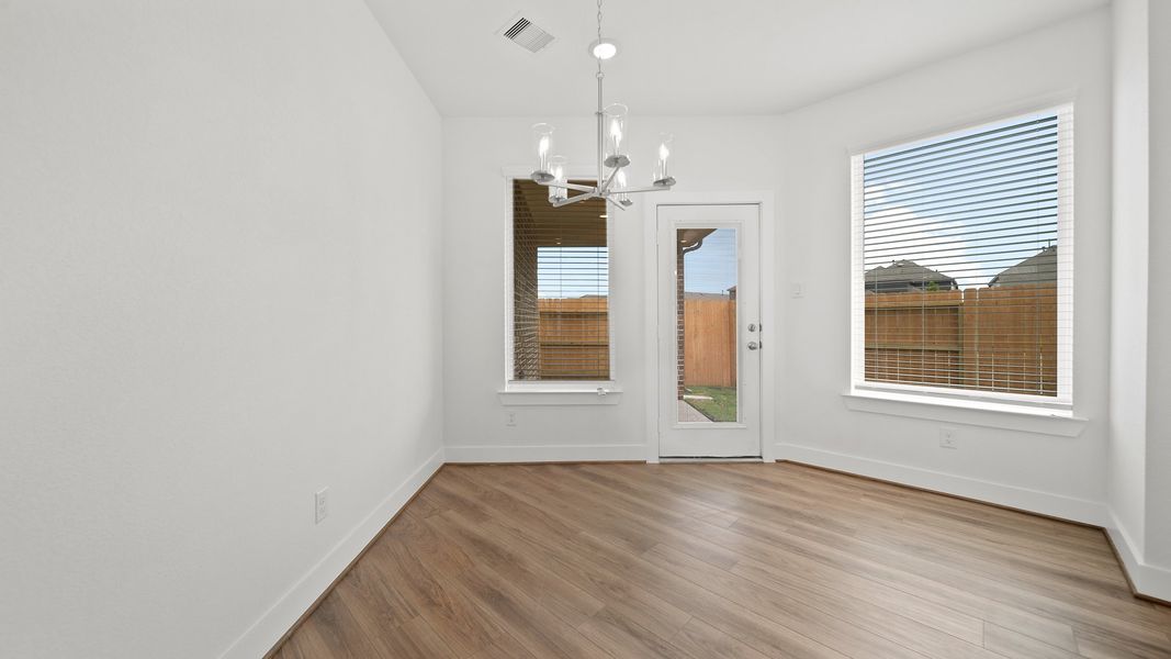 Representative unfurnished interior of a home built from the Rosewood – Courtyard Collection by Chesmar Homes in Jordan Ranch, Pattison (Image 9). Representative unfurnished interior of a home built from the Rosewood – Courtyard Collection by Chesmar Homes in Jordan Ranch, Pattison (Image 9).