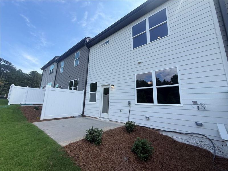 Exterior details and patio area of a home in The Towns at Auburn Station East, Auburn (Image 16).