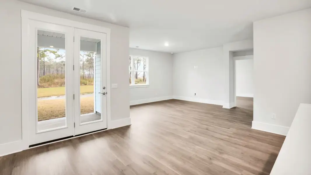 Representative unfurnished interior of a home built from the Claiborne by D.R. Horton in The Highlands at Cedar Hill Landing, Navassa (Image 14).