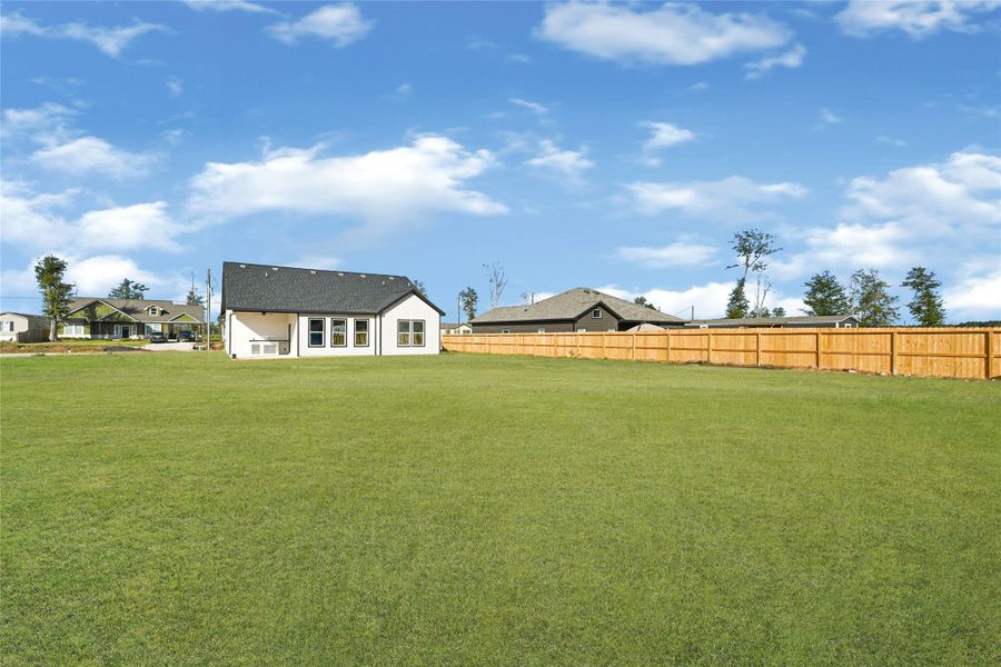 Exterior details and patio area of a home in , Huffman (Image 4).