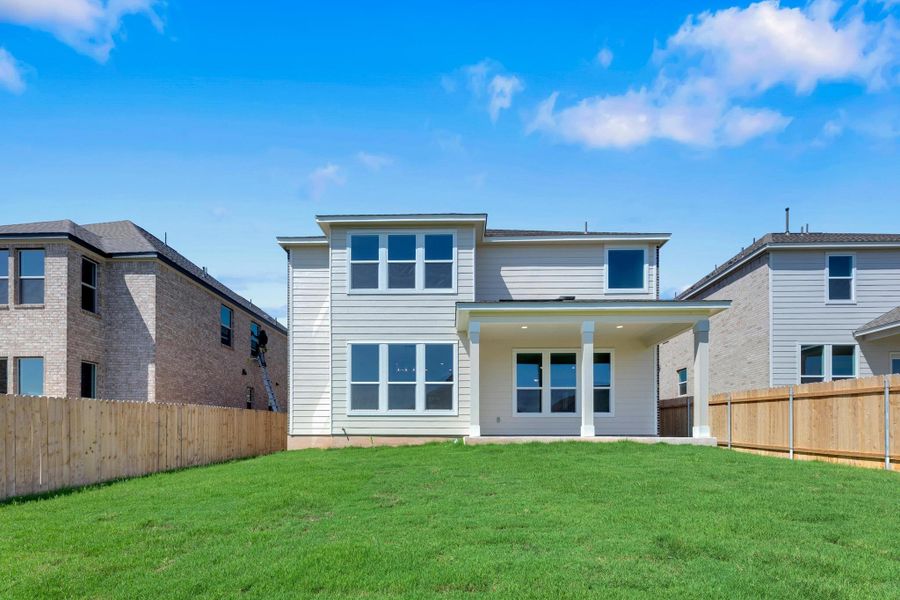 Front exterior of a new home in Salerno - Classic Collection, Round Rock, TX, highlighting curb appeal (Image 2). Front exterior of a new home in Salerno - Classic Collection, Round Rock, TX, highlighting curb appeal (Image 2).