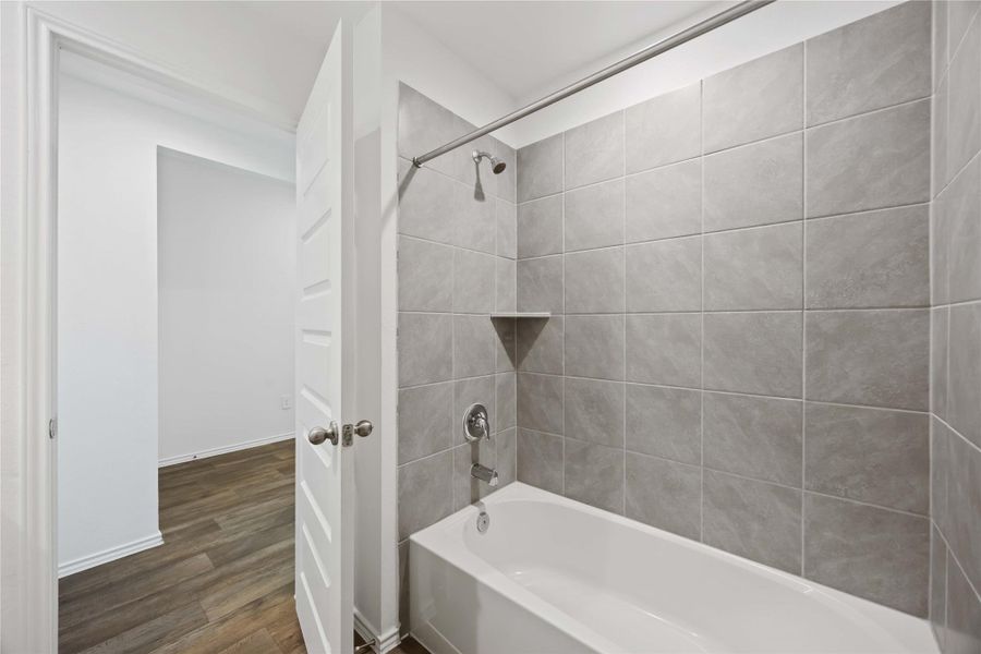 Furnished interior view inside a new home in Tamarron, Fulshear (Image 16).