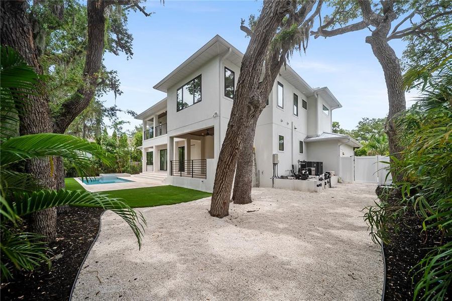 Exterior details and patio area of a home in , Sarasota (Image 32).