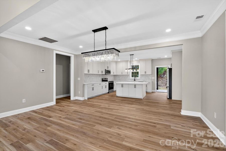 Spacious, unfurnished interior of a new home in , Lenoir (Image 40).