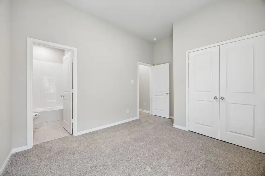 Bedroom in the Sabine home plan by Trophy Signature Homes – REPRESENTATIVE PHOTO Bedroom in the Sabine home plan by Trophy Signature Homes – REPRESENTATIVE PHOTO