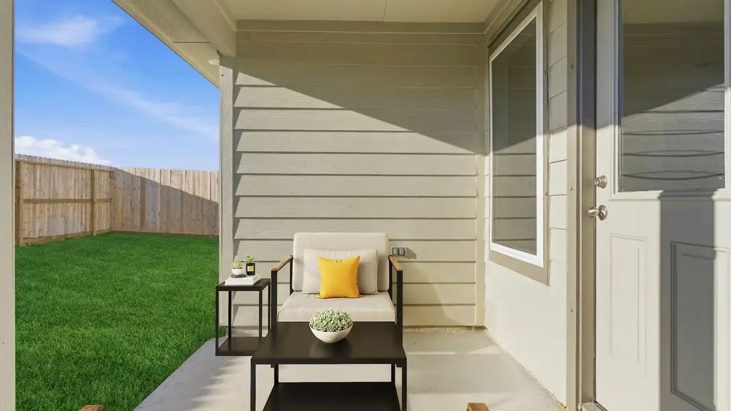 Exterior details and patio area of a home in Lakes at Westland Ranch, League City (Image 2).