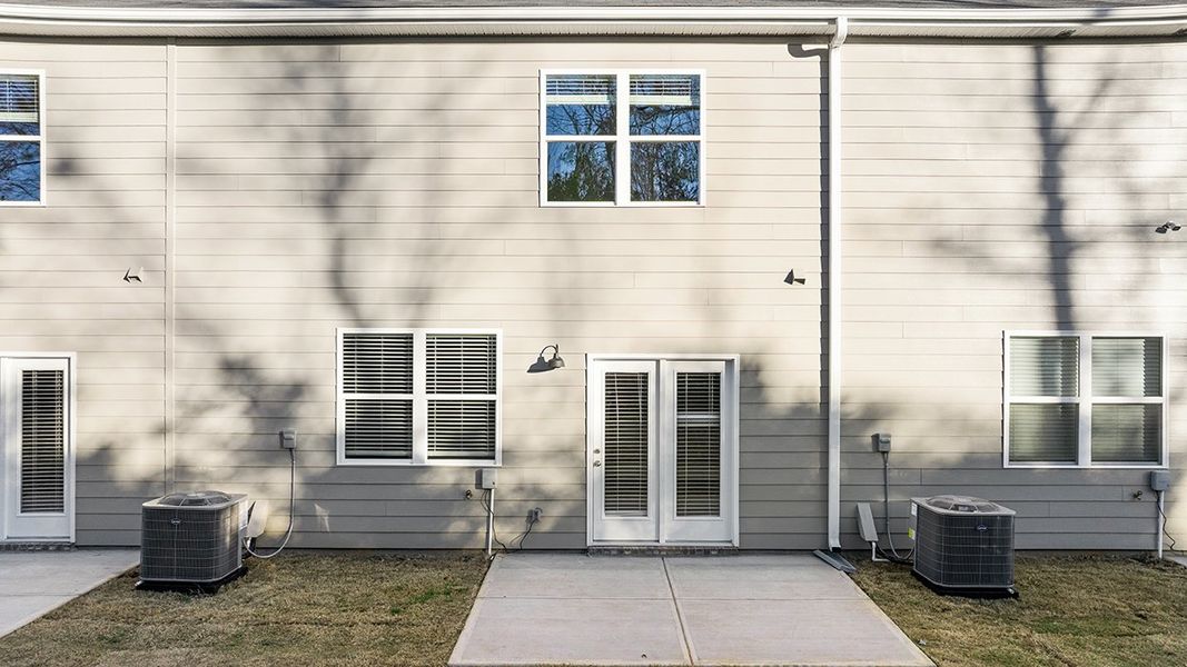 Exterior details and patio area of a home in Laurel Park Townhomes, Hephzibah (Image 3).