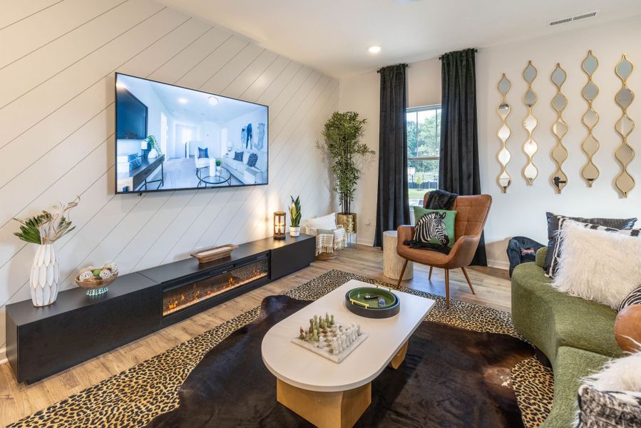 Representative furnished interior of a home built from the Myka TH by True Homes in Village at Reedy Creek Townhomes, Charlotte (Image 6).