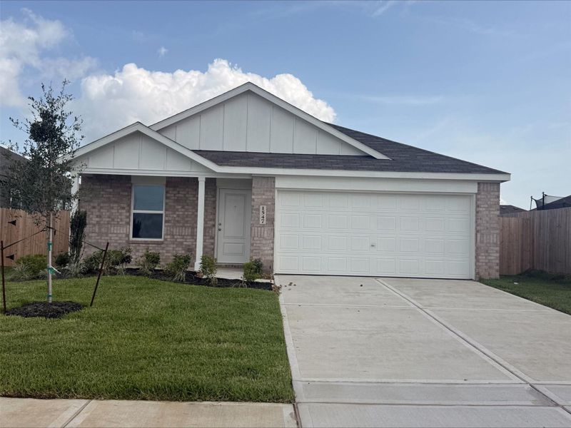 Front exterior of a new home in Sweetgrass Village, Crosby, TX, highlighting curb appeal (Image 2). Front exterior of a new home in Sweetgrass Village, Crosby, TX, highlighting curb appeal (Image 2).
