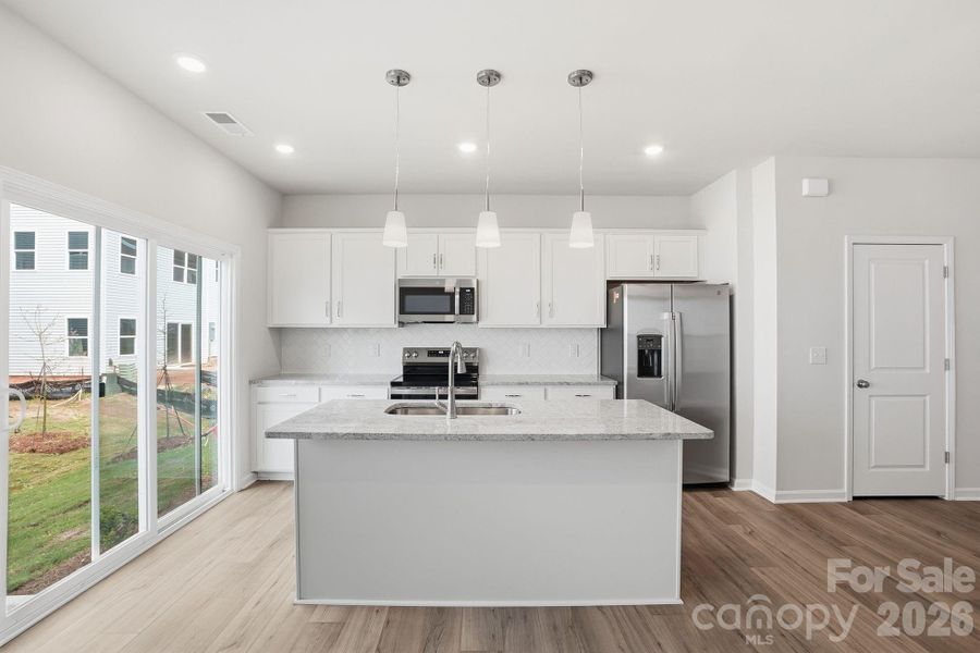 Furnished interior view inside a new home in Sloan Station, Charlotte (Image 10).