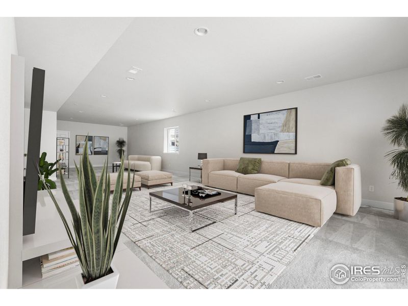 Finished Walk-Out Basement. This photo has been virtually staged to provide visual ideas for how furniture can be arranged in this area of the home.