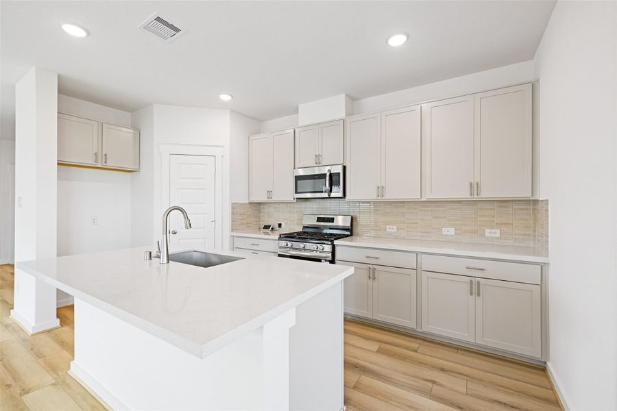 Furnished interior view inside a new home in Sunterra, Katy (Image 14). Furnished interior view inside a new home in Sunterra, Katy (Image 14).