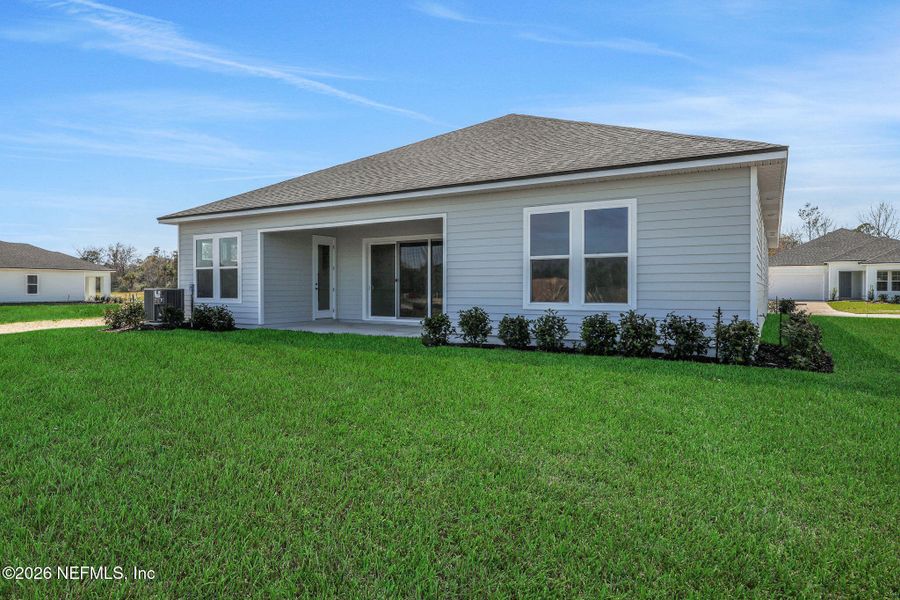 Exterior details and patio area of a home in Veranda Bay, Flagler Beach (Image 3).