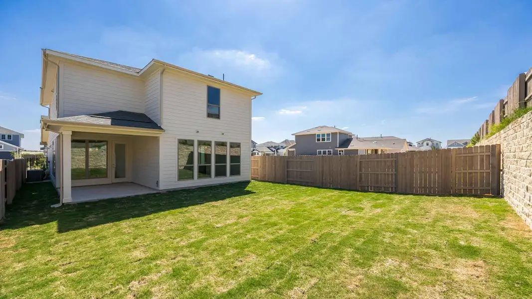 Exterior details and patio area of a home in Easton Park, Austin (Image 3).