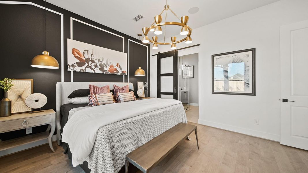 Masterful sliding barn-door that leads to the luxurious bathroom, gives this main bedroom a resort-like ambiance! Masterful sliding barn-door that leads to the luxurious bathroom, gives this main bedroom a resort-like ambiance!