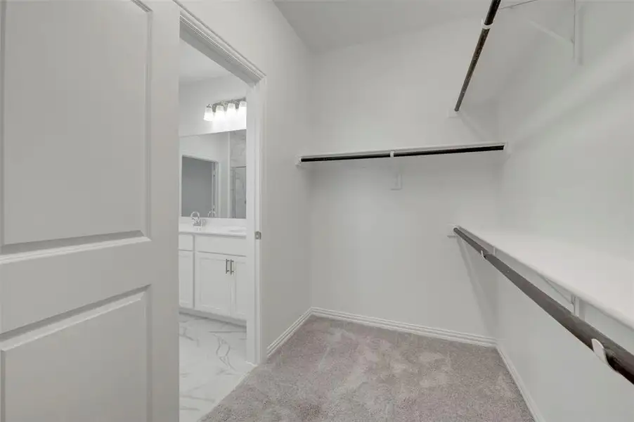 Furnished interior view inside a new home in Lily Creek at Sutton Fields, Aubrey (Image 9).