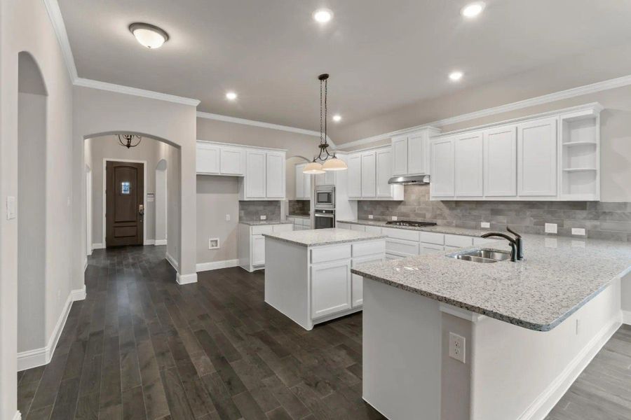 Kitchen | Concept 2533 at Abe's Landing in Granbury, TX by Landsea Homes