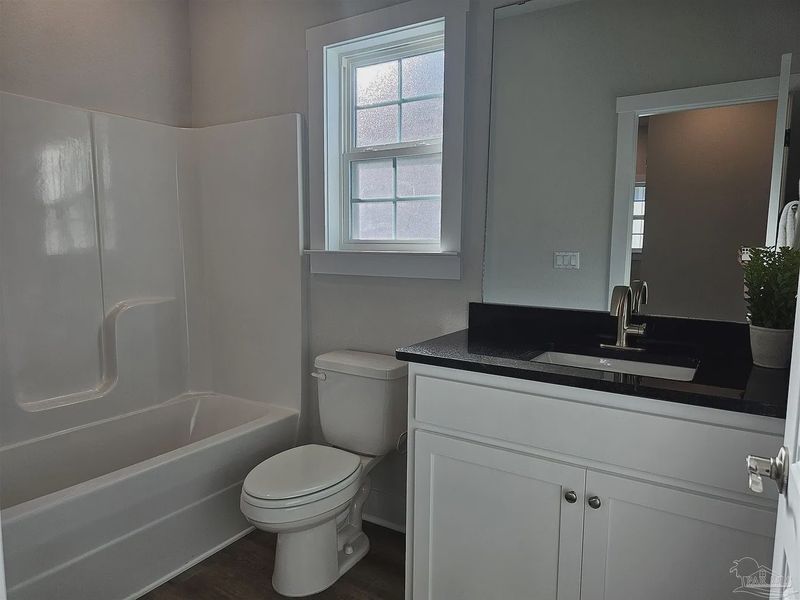 Furnished interior in a model home at Downtown Pensacola in Pensacola (Image 11). Furnished interior in a model home at Downtown Pensacola in Pensacola (Image 11).