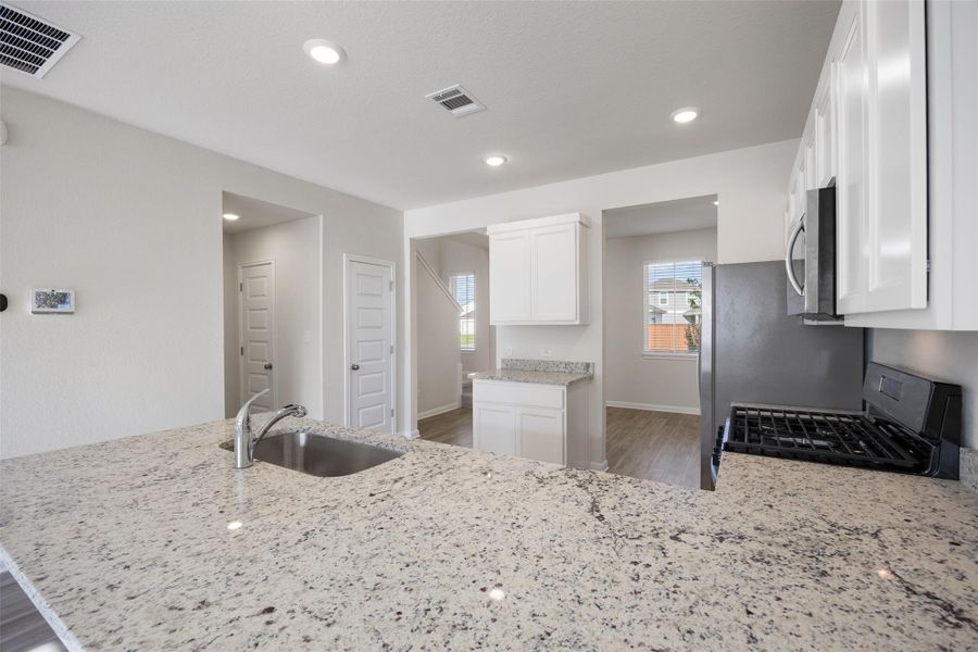 Furnished interior view inside a new home in Avery Centre, Round Rock (Image 11).