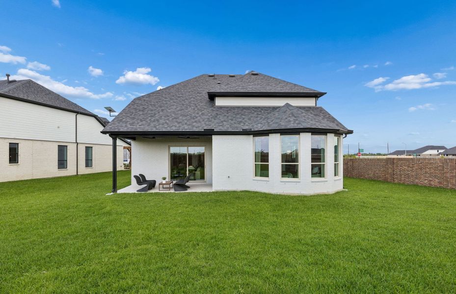 Representative exterior details of a home built from the Iredell by Pulte Homes in Katy Court, Katy (Image 3).