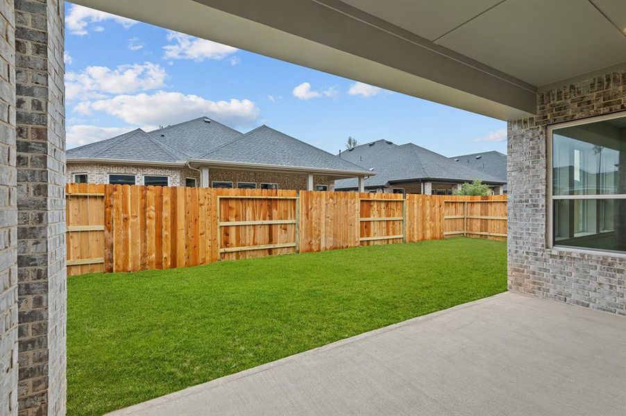 EXAMPLE PHOTO: another view of patio and fully sodded rear yard